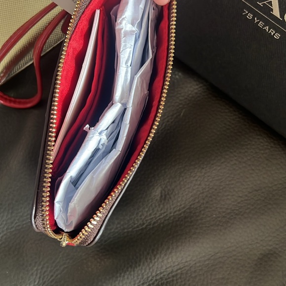 Coach signature wristlet. NWT and gift box included. - Picture 4 of 7